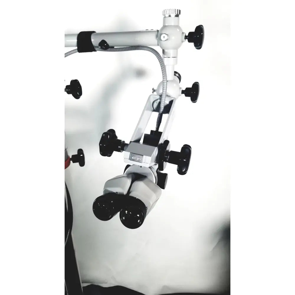 Silver and black zeiss opmi-1 prescott’s mark ii dental operating microscope with adjustable arms and floor stand