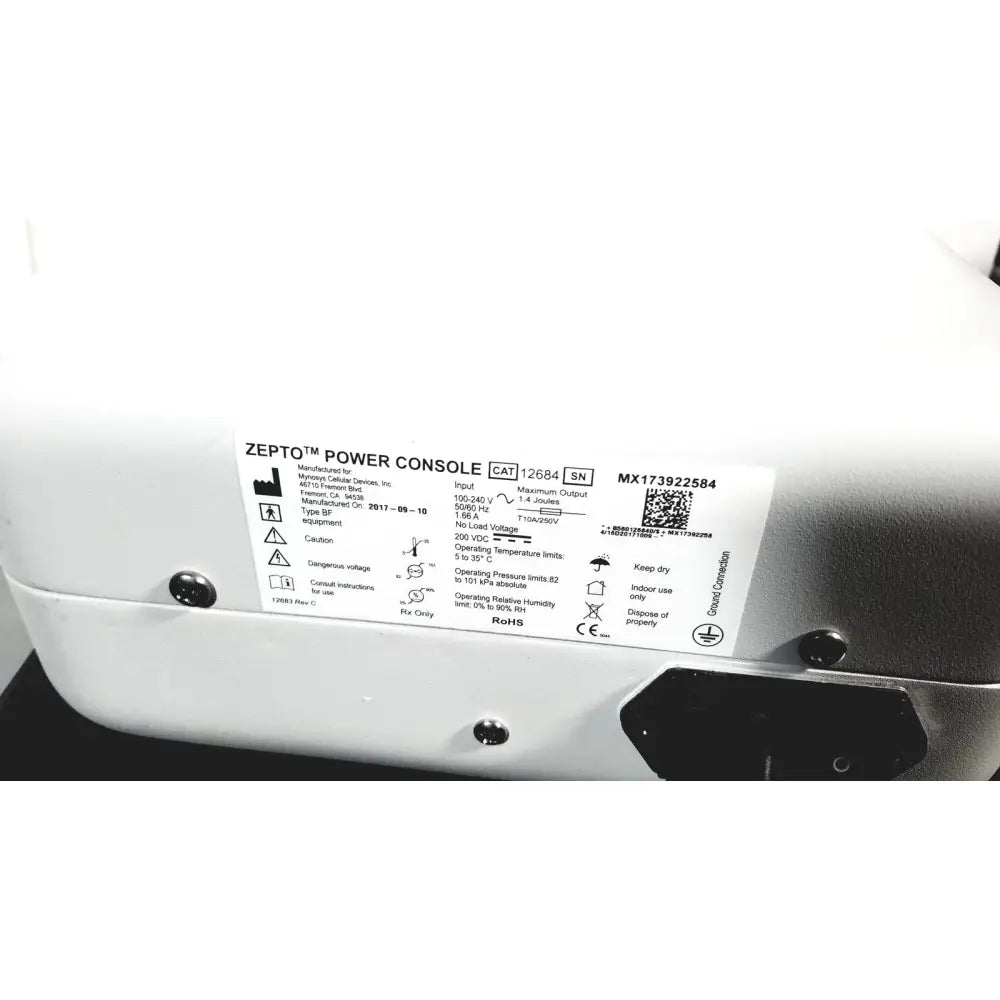 White zepto power console with black label and specifications for zepto precision pulse capsulotomy device with stand
