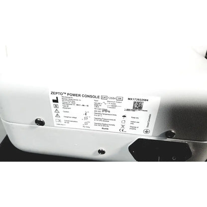 White zepto power console with black label and specifications for zepto precision pulse capsulotomy device with stand