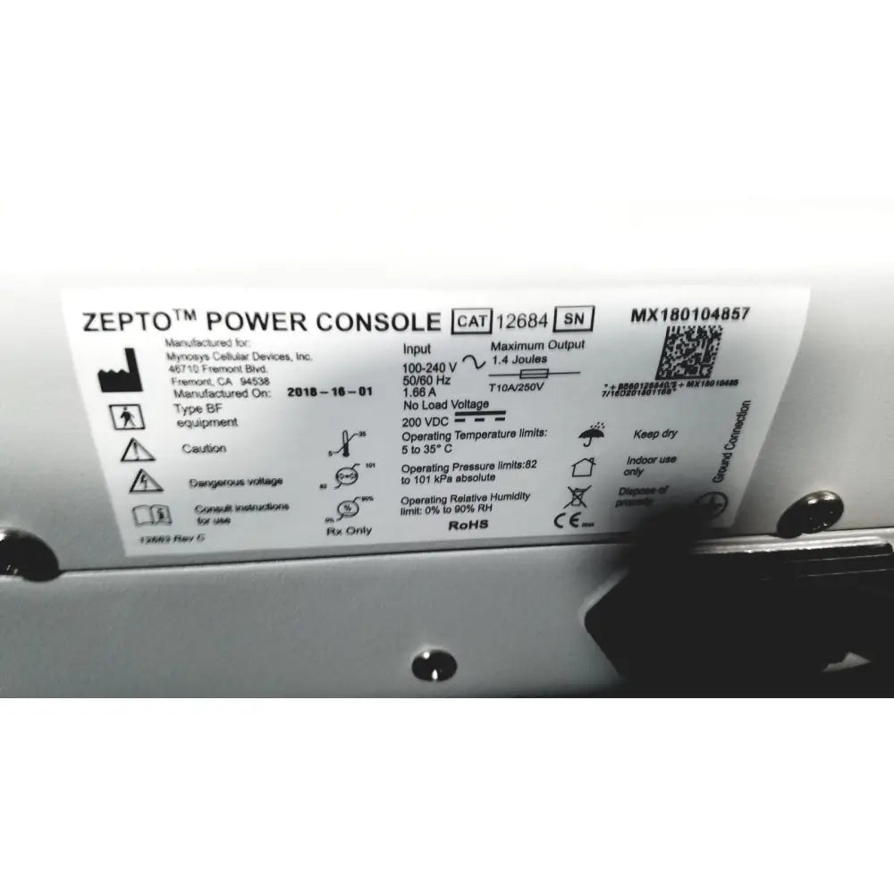 White label with black text showing specifications on the back of a zepto power console for precision pulse capsulotomy use