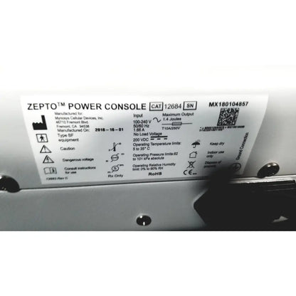 White label with black text showing specifications on the back of a zepto power console for precision pulse capsulotomy use