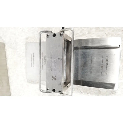 Silver metallic meshcraft ii industrial separator with engraved markings and metal frame for zimmer meshgraft dermatome