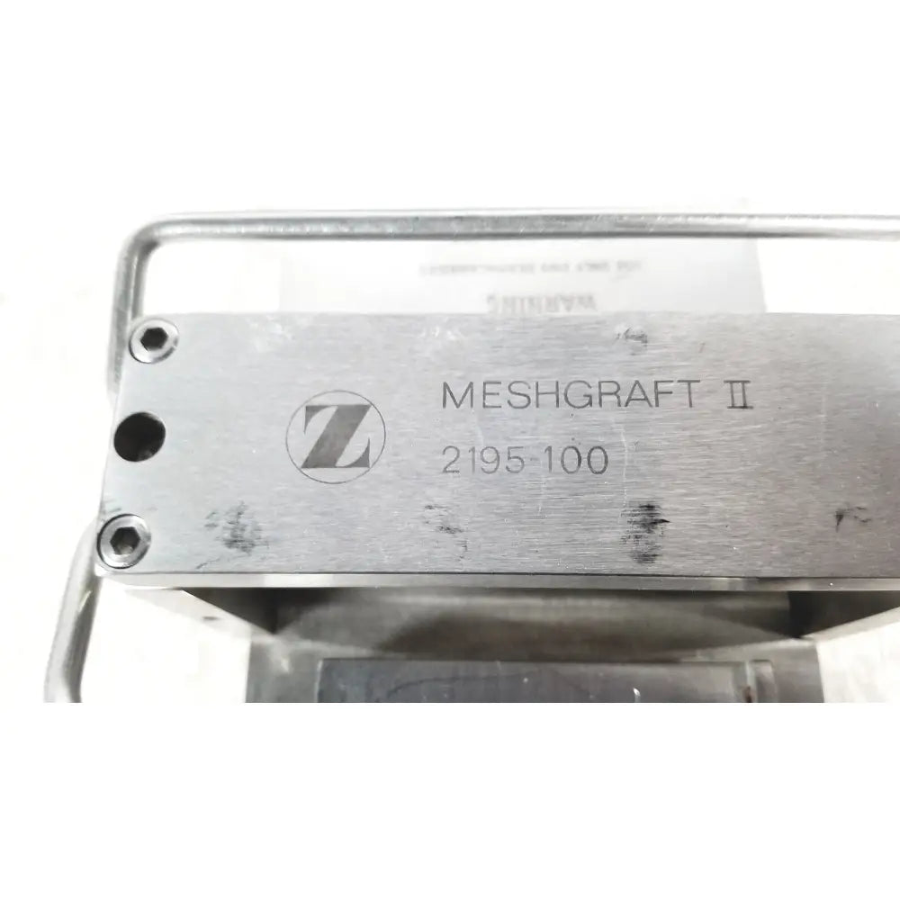 Silver metallic zimmer meshgraft dermatome ii 2195-100 with skin graft blades and circular z logo