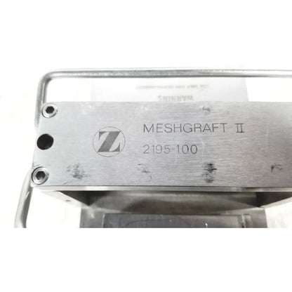 Silver metallic zimmer meshgraft dermatome ii 2195-100 with skin graft blades and circular z logo