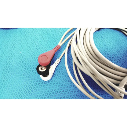 ZOLL 3-lead ECG EKG patient monitoring cable lot of 2 with red and black electrode leads and white cables on blue surface