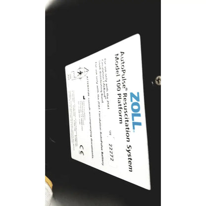 White rectangular label on the zoll autopulse resuscitation system model 100 platform for autopulse resuscitation use