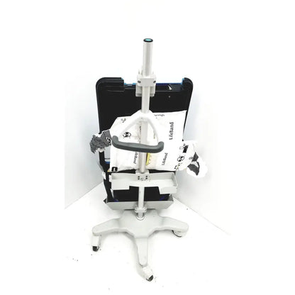 White adjustable medical examination chair with black armrests and casters for zoll autopulse resuscitation system use