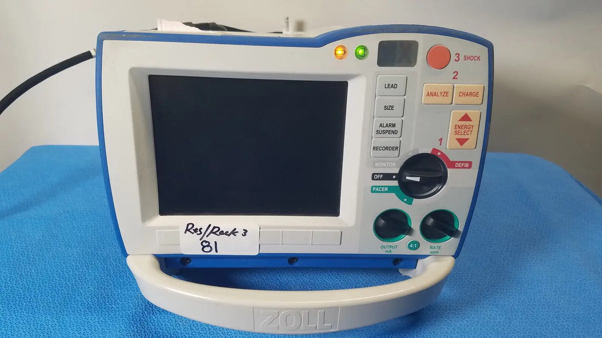 Blue and white zoll r series als patient monitor with digital screen control buttons and surepower battery pack